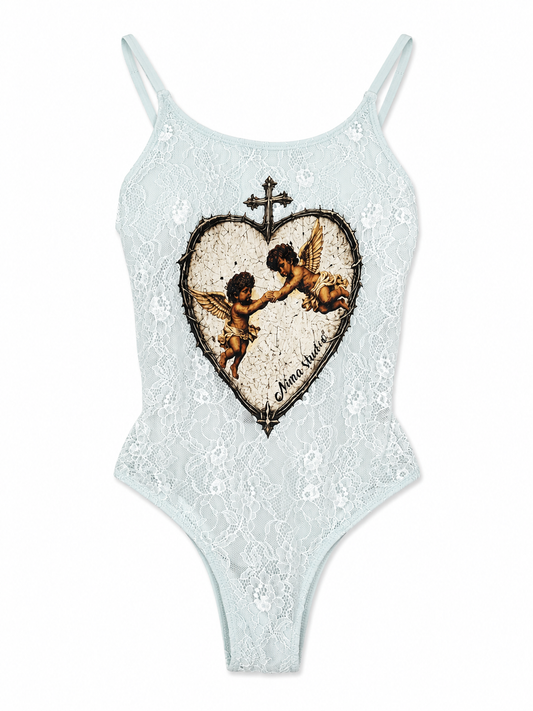 Costume in pizzo con gonna